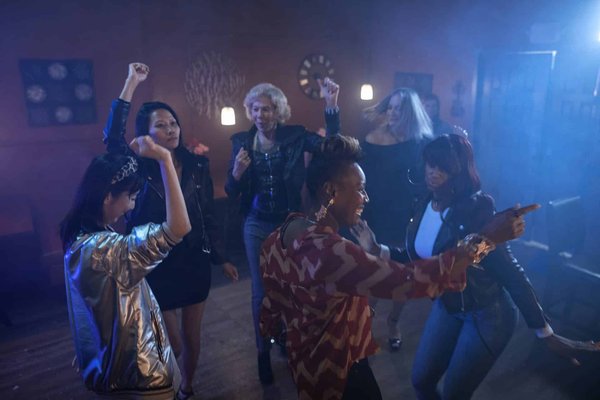 How does social dancing benefit emotional and social well-being?