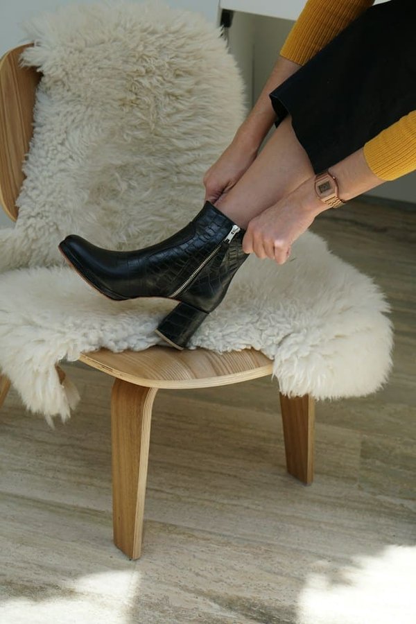 How Can You Style Ankle Boots for a Chic and Professional Office Look?